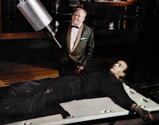 goldfinger-threatens-james-bond-with-a-laser